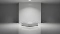 Empty white room with a spotlight on a display pedestal Royalty Free Stock Photo