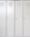 Empty white school metal lockers