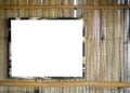 An empty white sign for information against a bamboo wooden fence background
