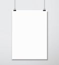 Empty white A4 sized vector paper mockup hanging with paper clip
