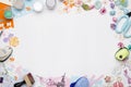 Empty white space in the center surrounded by paper flowers, multi-colored paper and scrapbooking materials Royalty Free Stock Photo