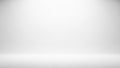 Empty White Studio Background with Subtle Spotlight Effect white background clean Royalty Free Stock Photo