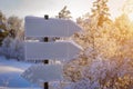 Empty white track pointers, guidepost in sunlight against winter nature background. Directional arrow signs on wooden pole in Royalty Free Stock Photo