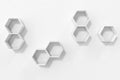 Empty white wall with hexagon shelves on the wall, 3D rendering