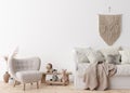 Empty white wall in modern child room. Mock up interior in scandinavian, boho style. Free, copy space for your picture