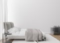 Empty white wall in modern and cozy bedroom. Mock up interior in contemporary style. Free space, copy space for your Royalty Free Stock Photo