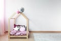 White wall in spacious baby bedroom interior