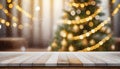 Empty white wood table top with abstract warm living room decor with Christmas tree Royalty Free Stock Photo