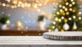 Empty white wood table top with abstract warm living room decor with Christmas tree Royalty Free Stock Photo
