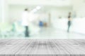 Empty white wood table top on blur hospital interior Royalty Free Stock Photo