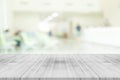 Empty white wood table top on blur hospital interior Royalty Free Stock Photo