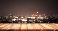 Empty of white wood table top on blur night town,cityscape