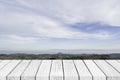 Empty white wood table top over nature blue sky landscape Royalty Free Stock Photo