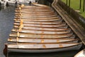 Empty White Wooden Rowing Boats Tethered and Moored on The River Avon