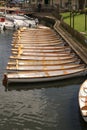 Empty White Wooden Rowing Boats Tethered and Moored on The River Avon. Potrait.