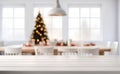 Empty white wooden table top with defocused modern dinning room and Christmas tree in the background for design