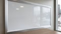 Empty whiteboard in a modern office setting by a window. Royalty Free Stock Photo