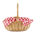 Empty wicker basket with red checkered tablecloth for picnic Royalty Free Stock Photo