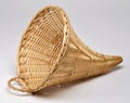 Empty wicker basket in the shape of cornucopia Royalty Free Stock Photo