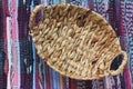 Empty wicker basket with two handles