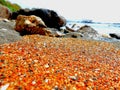 Mystical wonderful stones beach, nature color rainbow sand