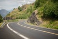 empty winding asphalt road in beautiful green mountains Aurlandsfjord Flam