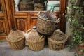 Empty wine bottles in wicker baskets