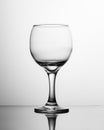 Empty wine glass black and white. Photo of a single round glass wine glass Royalty Free Stock Photo