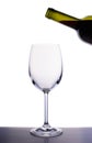 Empty wine glass and bottle of red wine Royalty Free Stock Photo