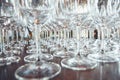 Empty wine glasses on the bar table, close up horizontal shot. Restaurant serving. Royalty Free Stock Photo