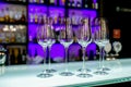 Empty wine glasses on the bar table in the restaurant. Table setting for celebration. Banquet service, catering food Royalty Free Stock Photo