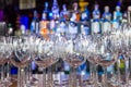 Empty wine glasses with color blur background in bar Royalty Free Stock Photo