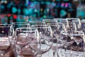 Empty wine glasses with color blur background in bar Royalty Free Stock Photo