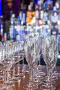 Empty wine glasses with color blur background in bar Royalty Free Stock Photo