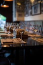 Wine glasses and table setting in restaurant