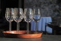 Empty wine glasses on tray Royalty Free Stock Photo