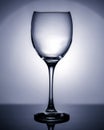Empty wineglass in blue. Object photography