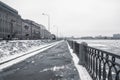 Empty winter embankment in Saint Petersburg with a view of the N Royalty Free Stock Photo