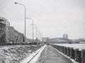 Empty winter embankment in Saint Petersburg with a view of the Neva river Royalty Free Stock Photo