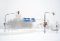 Empty winter road in blizzard