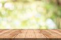 Empty wood table on blurred background copy space for montage your product or design,Blank brown board with abstract blurred Royalty Free Stock Photo