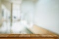 Empty Wood table with blurred office background.