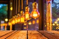 Empty wood table and Coffee shop blur background with bokeh image