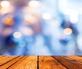 Empty wood table and Coffee shop blur background with bokeh image