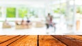 Empty wood table and Coffee shop blur background with bokeh image