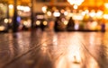 Empty wood table top bar on blur cafe restaurant in dark background Royalty Free Stock Photo