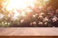 Empty wood table top on blur abstract green from garden and house background. Royalty Free Stock Photo