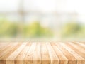 Empty wood table top on blur abstract green garden from window view in the morning Royalty Free Stock Photo