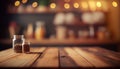 Empty wood table top on blur bakery shop or cafe restaurant with abstract bokeh background Royalty Free Stock Photo