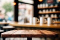 Empty wood table top and blur of cafe restaurant in dark night background Royalty Free Stock Photo